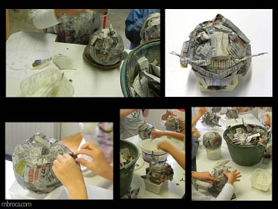 Cours, plusieurs étapes de réalisation de masques en papier machés.